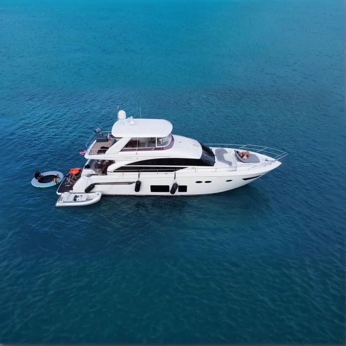 Aerial view of the Princess 68 foot luxury yacht charter sailing in deep blue waters of Puerto Rico.