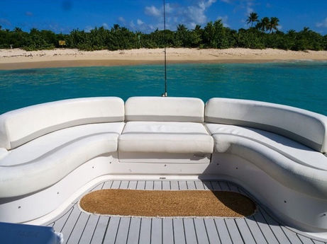 U-shaped outdoor seating on the aft deck of the Just to Splash Neptuno 60 private yacht rental.