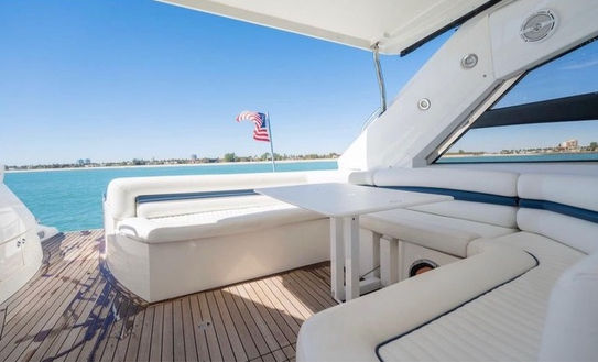 Outdoor aft deck seating on the Hibiki Sunseeker 60 private yacht rental in Fajardo.