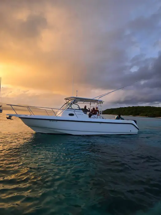 Novack Boston 28 private boat charter anchored at sunset in Puerto Rico.