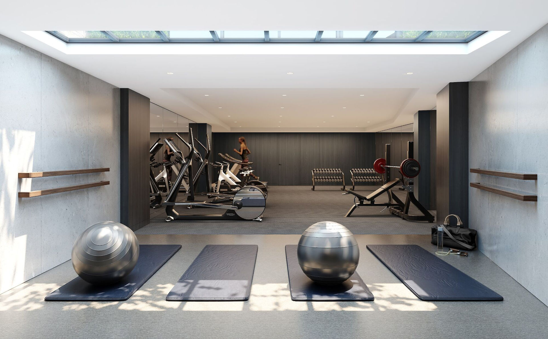 Resident fitness center at Six Garfield Place Condominiums, Brooklyn, with treadmills, elliptical machines, and free weights
