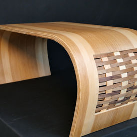 Custom bent wood coffee table with curved form and inset woven hardwood panel by Chisel Woodworking in London, Ontario