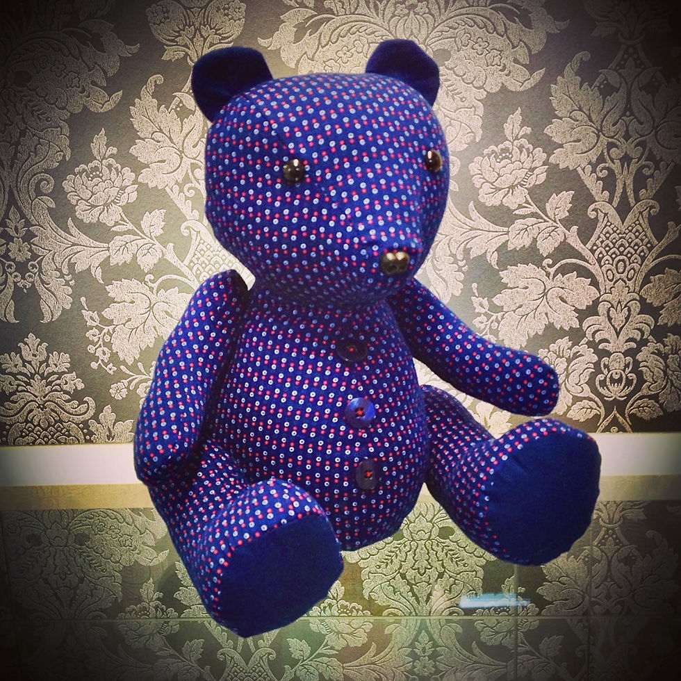Thumbnail: Blue patterned memory bear with buttons