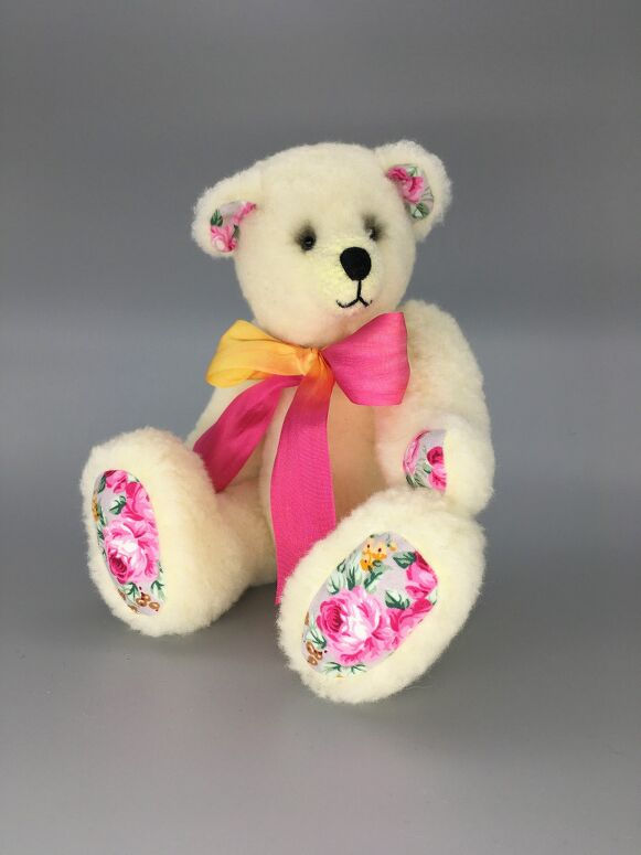 Thumbnail: Cream memory bear with floral print ears and feet, pink bow