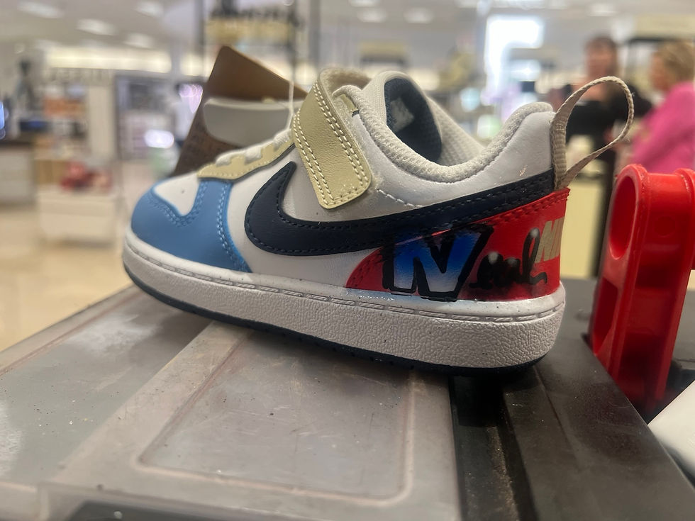 Personalized Nike shoe displayed at the Belk activation