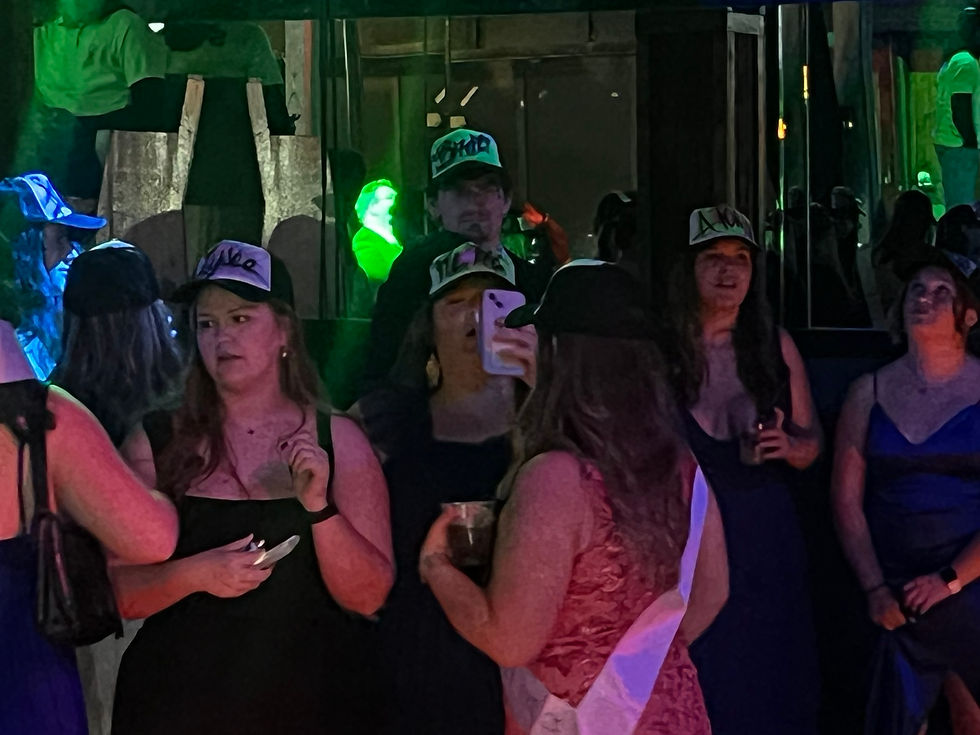 Students wearing personalized airbrushed hats at the University of South Carolina
