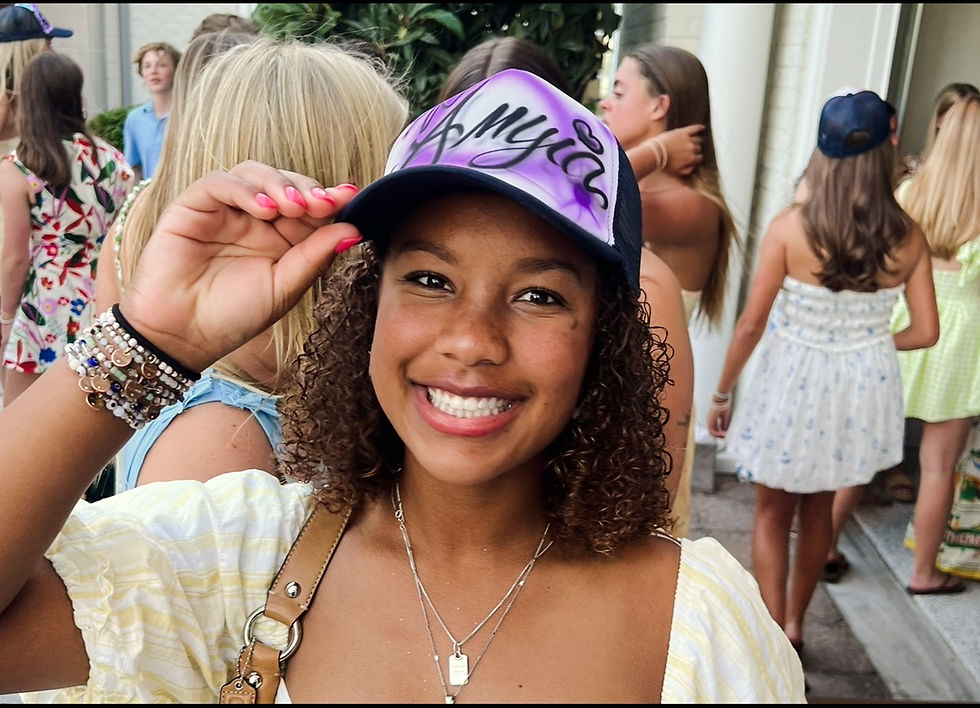Virginia Beach graduation party guest wearing a personalized airbrushed hat