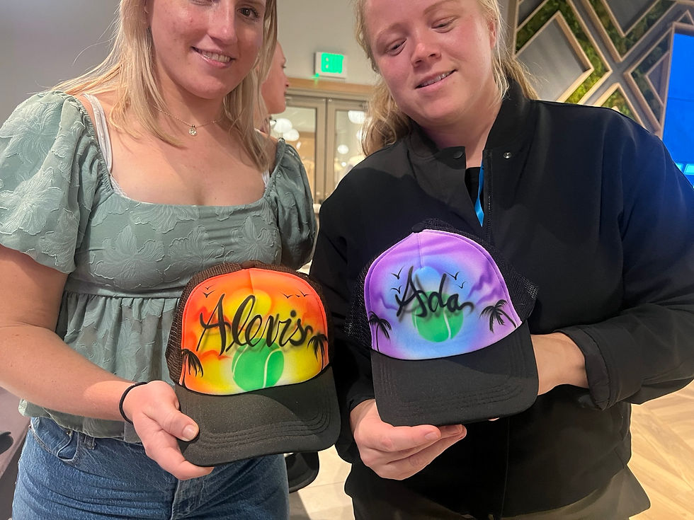 Personalized airbrushed trucker hats at a professional tennis tournament in Charleston, South Carolina