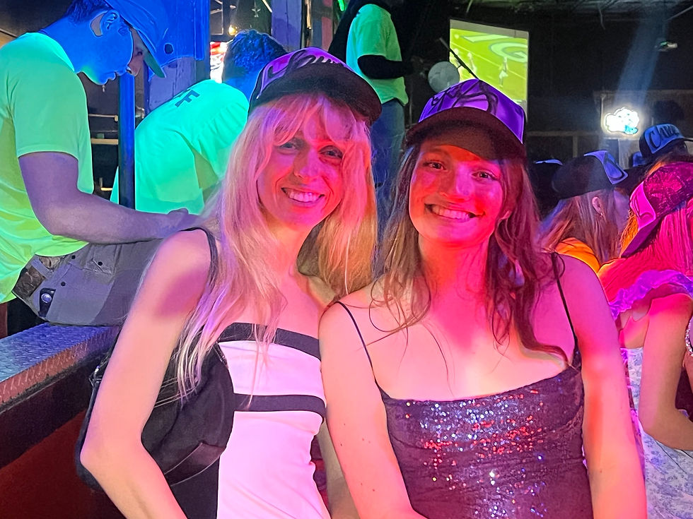 Delta Gamma guests at the University of South Carolina wearing personalized airbrushed hats
