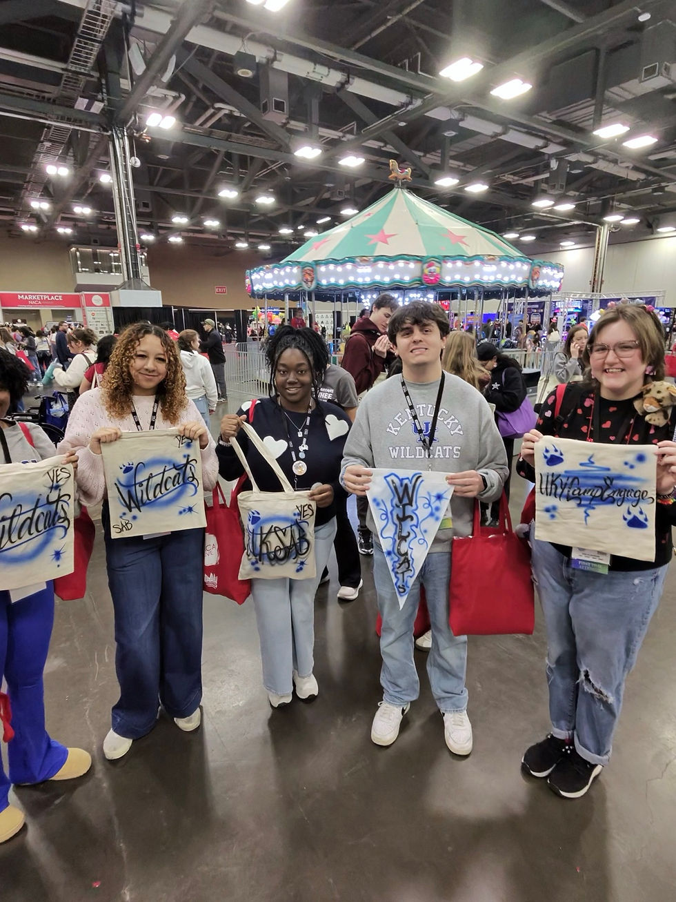 College students displaying custom airbrushed apparel in Birmingham