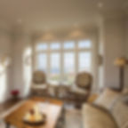 Double-hung replacement window with a transom window above, adding natural light and architectural detail