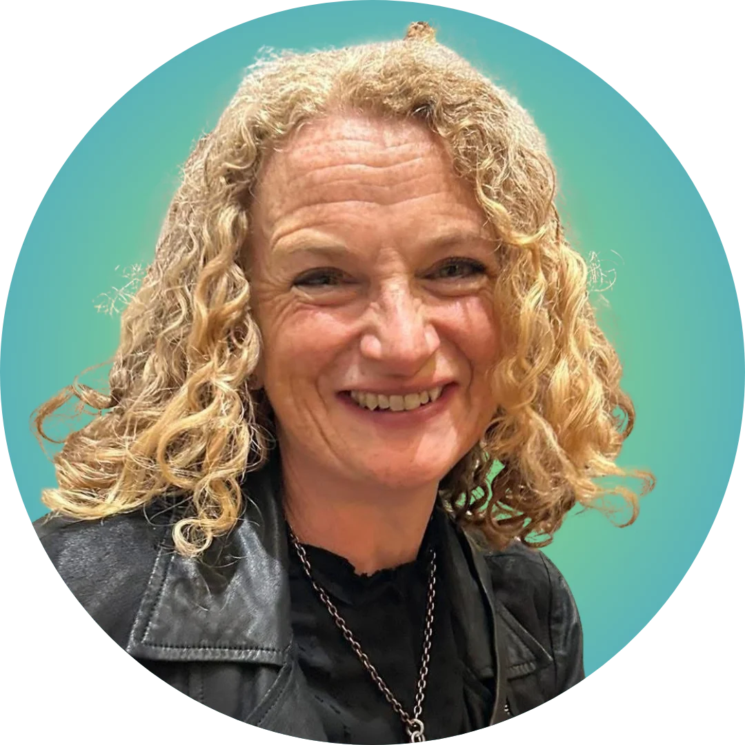 Smiling woman with curly blonde hair