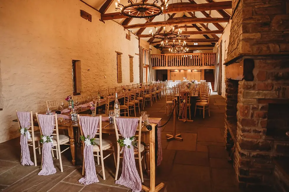 Elegant wedding reception tables, chairs, and decor. Weddings & Сeremonies in a rustic venue.