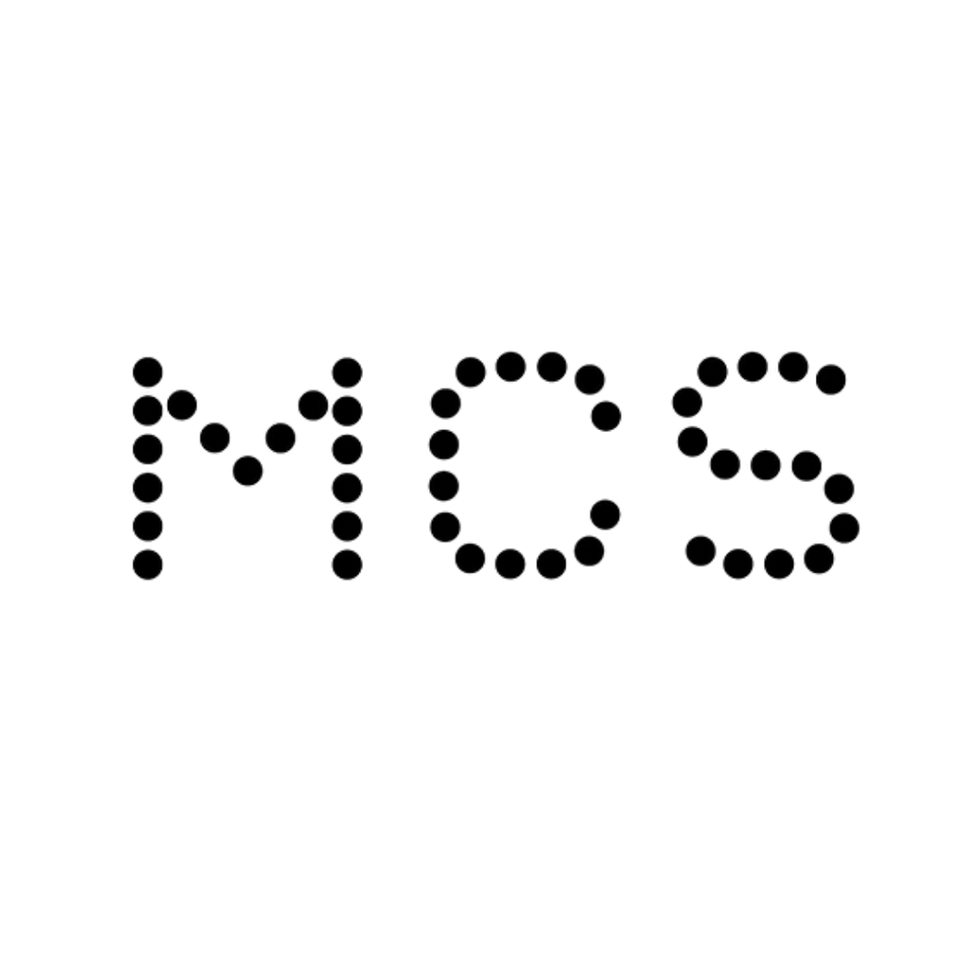 Dark image of faint stars, dots, and lights across the black background.