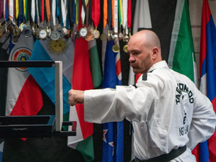 Taekwondo World Champion Brendan Doogan practicing power breaking using reusable PNP Breaker Boards