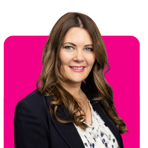 Woman smiling in a dark blazer