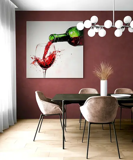 Abstract realism red wine canvas wall art displayed in a modern dining room, featuring a green bottle pouring burgundy wine into a glass with energetic splash details against a clean light background.
