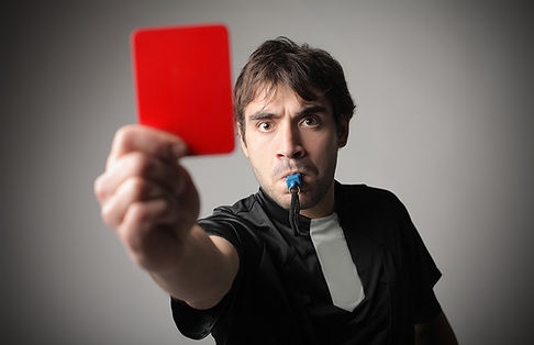 Referree showing red card