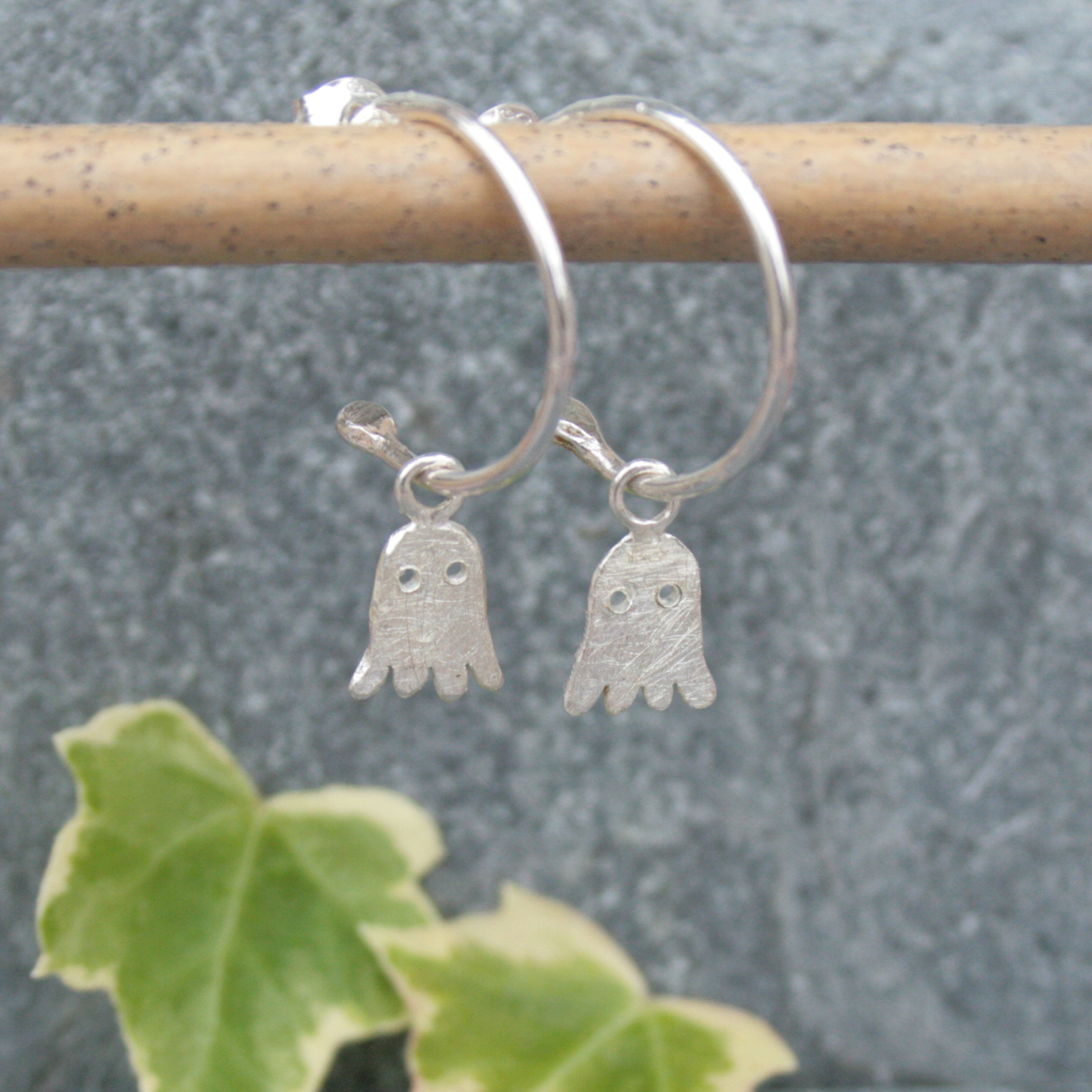 Silver ghost hoop earrings