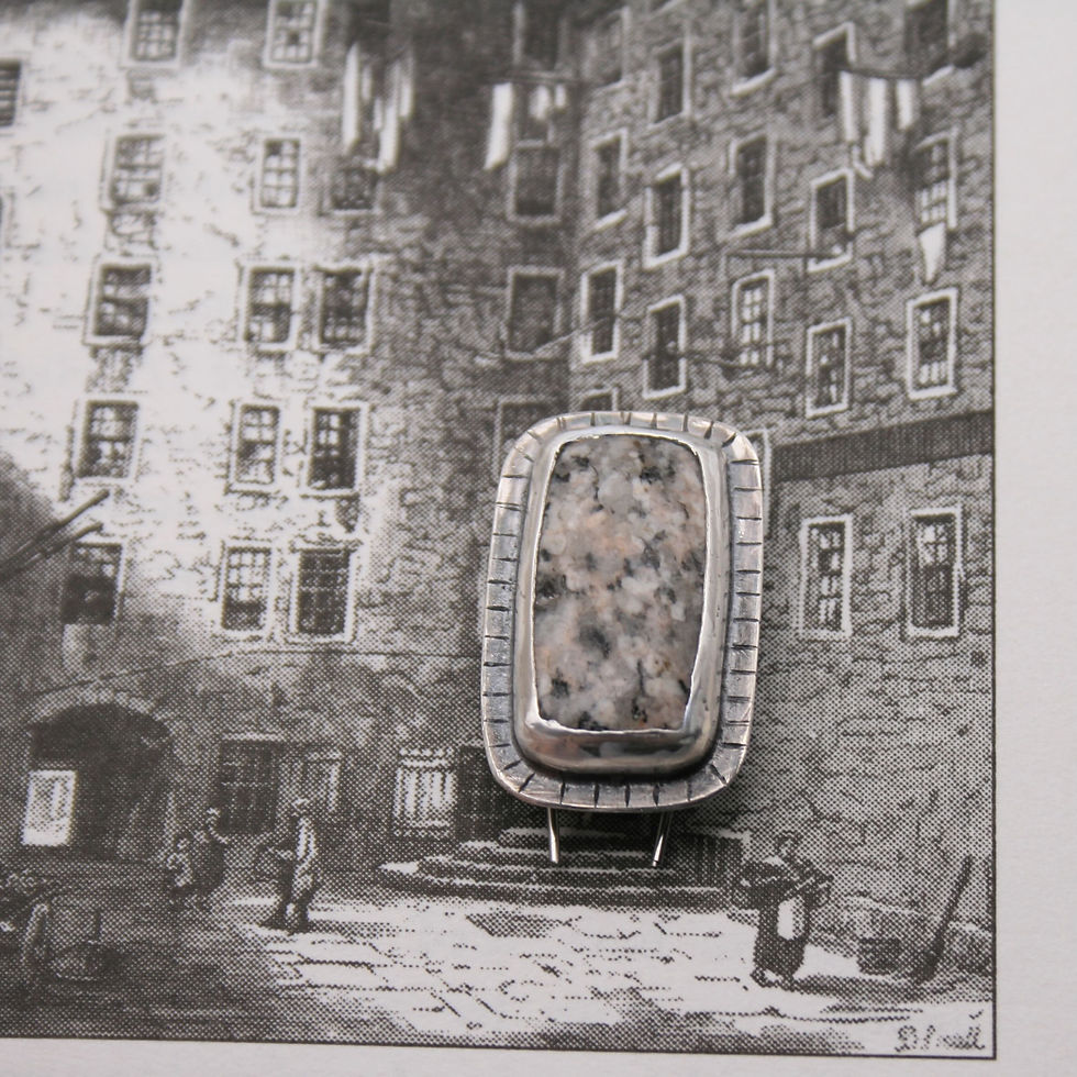 Thumbnail: Edinburgh cobblestone brooch on black and white old Edinburgh image
