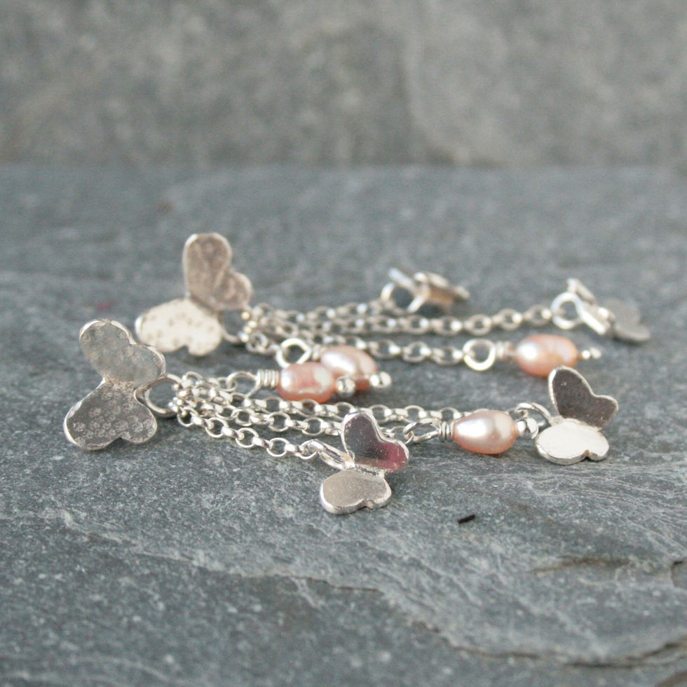Thumbnail: Long silver butterfly and pearl earrings