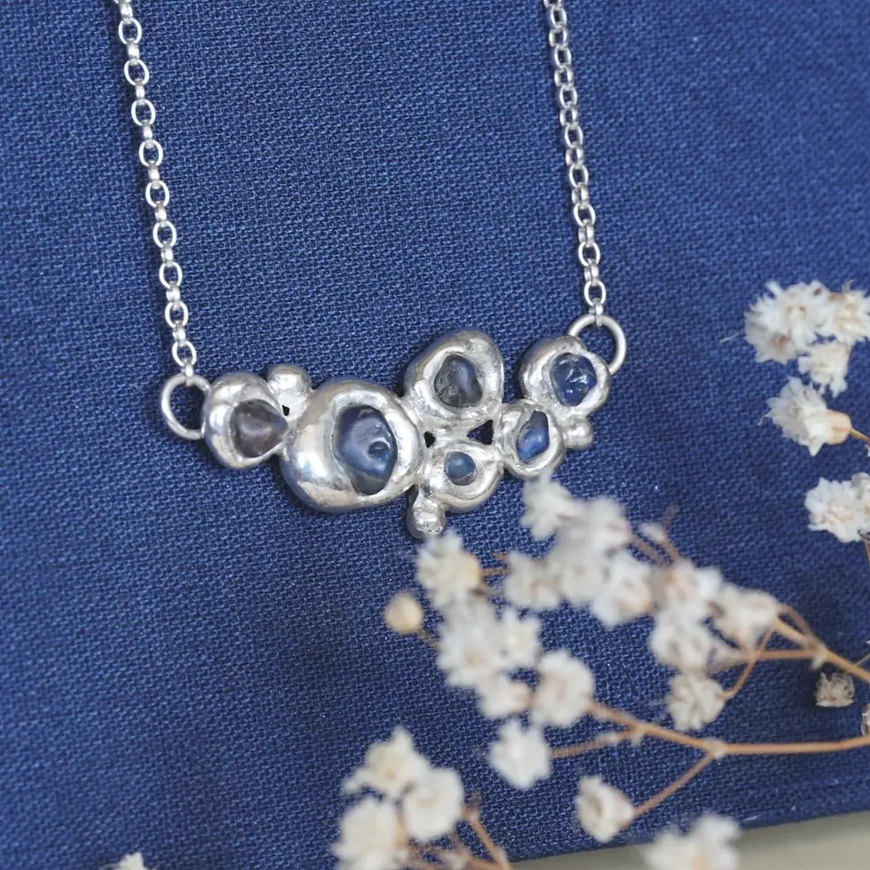 Thumbnail: Sapphire and molten silver necklace
