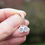 Thumbnail: Silver hoop earrings with snowflake charm