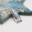 Thumbnail: Rectangular dendritic opal gemstone pendant