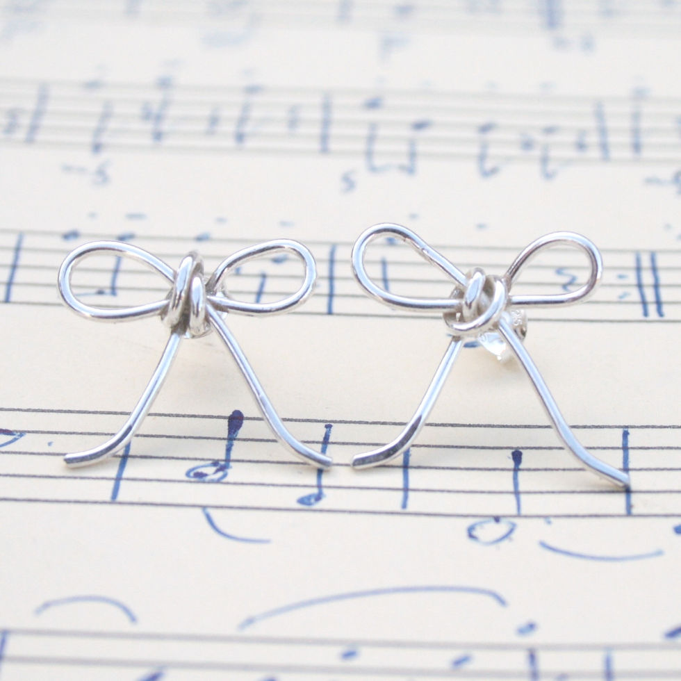 Thumbnail: Sterling silver bow earrings