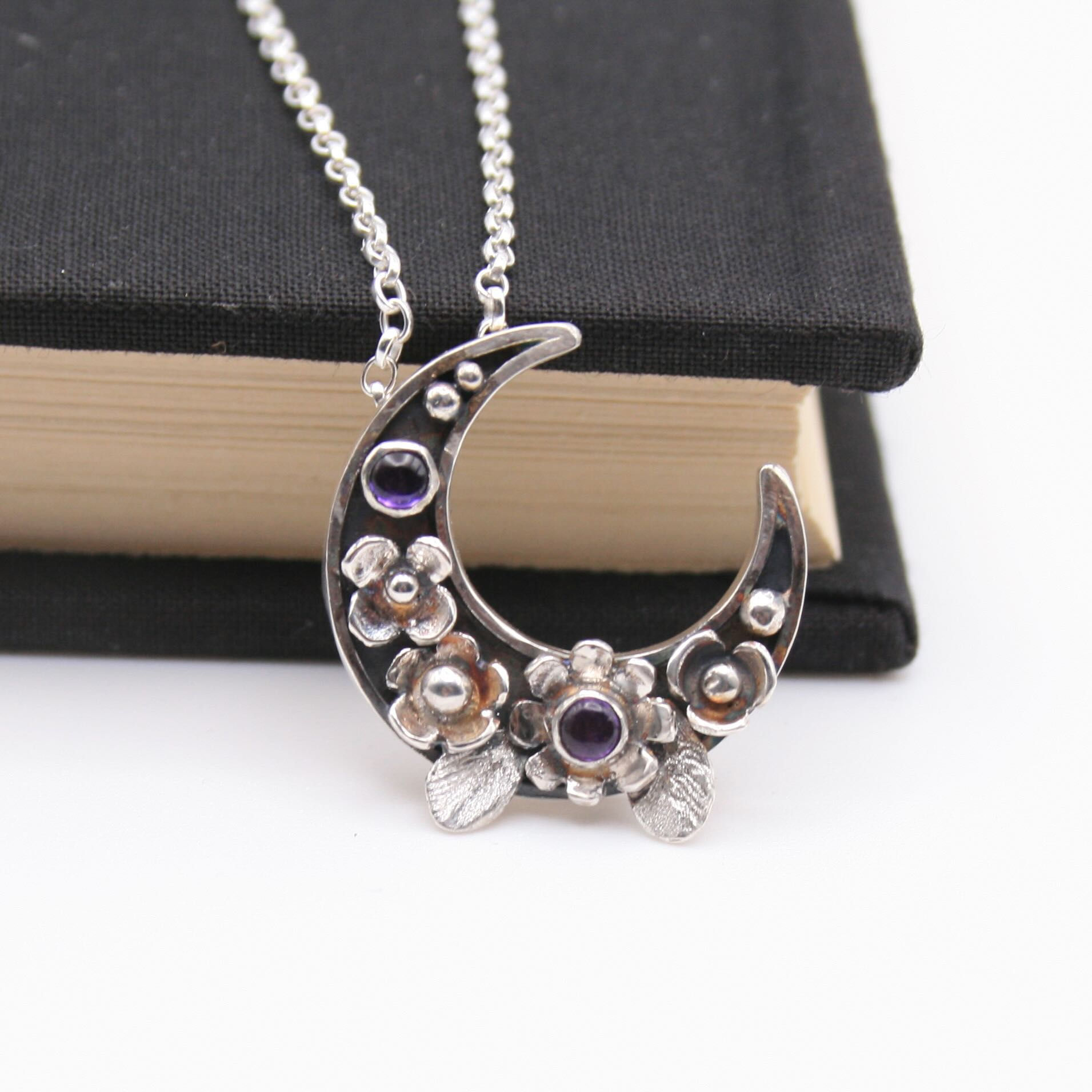 Sterling silver crescent moon necklace with flowers