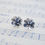 Thumbnail: Silver flower earrings with raw sapphire gemstones