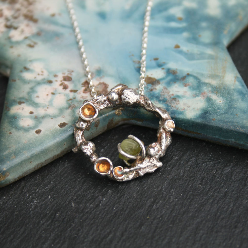 Thumbnail: Silver necklace with peridot gemstone, August birthstone