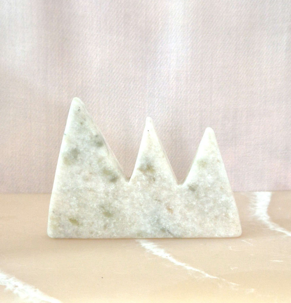Thumbnail: white calcite with serpentine mountain carving