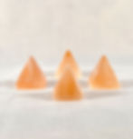 group of 4 small peach selenite pyramid in a diamond pattern