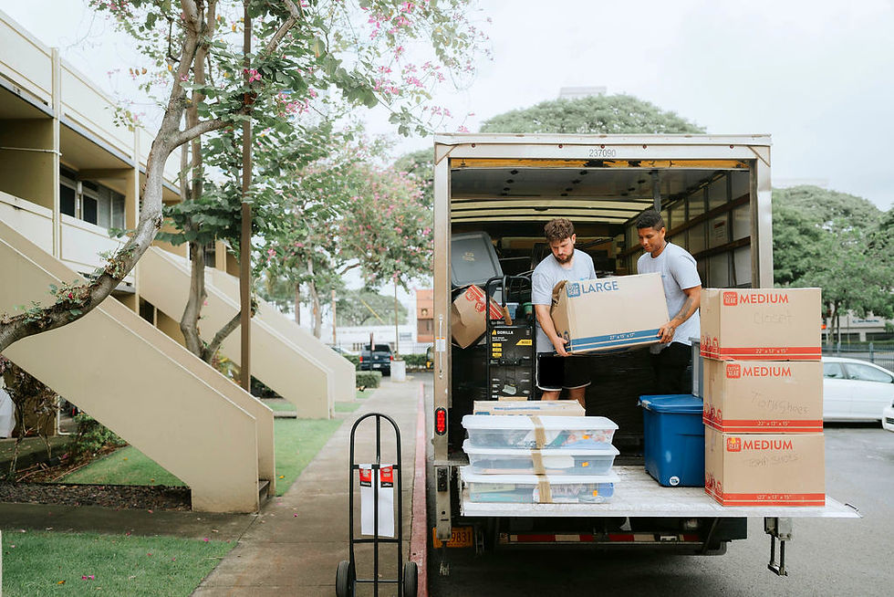 EZ MoveIt movers loading boxes into a truck for a safe long-distance move