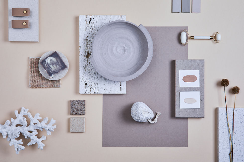 Flat lay of a Coastal-inspired moodboard featuring soft neutral tones, textured materials, natural stone, coral, and color swatches.