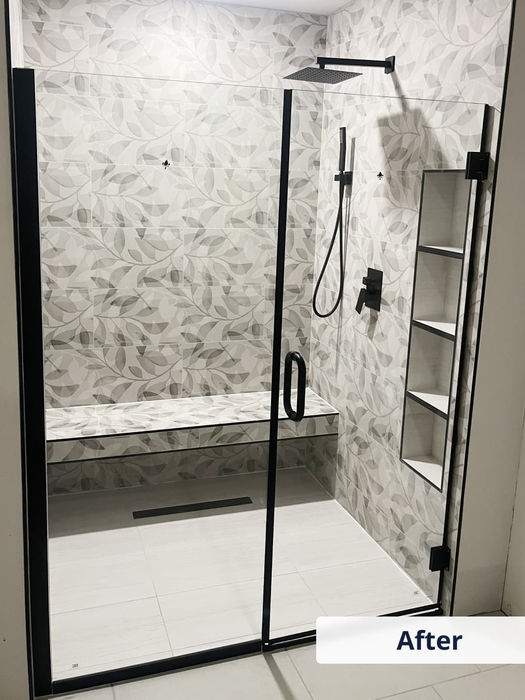 Custom shower tile with floral pattern and matte black fixtures