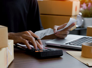 Person calculating moving costs from Alaska to the Lower 48.