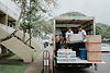 EZ MoveIt crew loading boxes and household belongings into a truck for a long-distance move