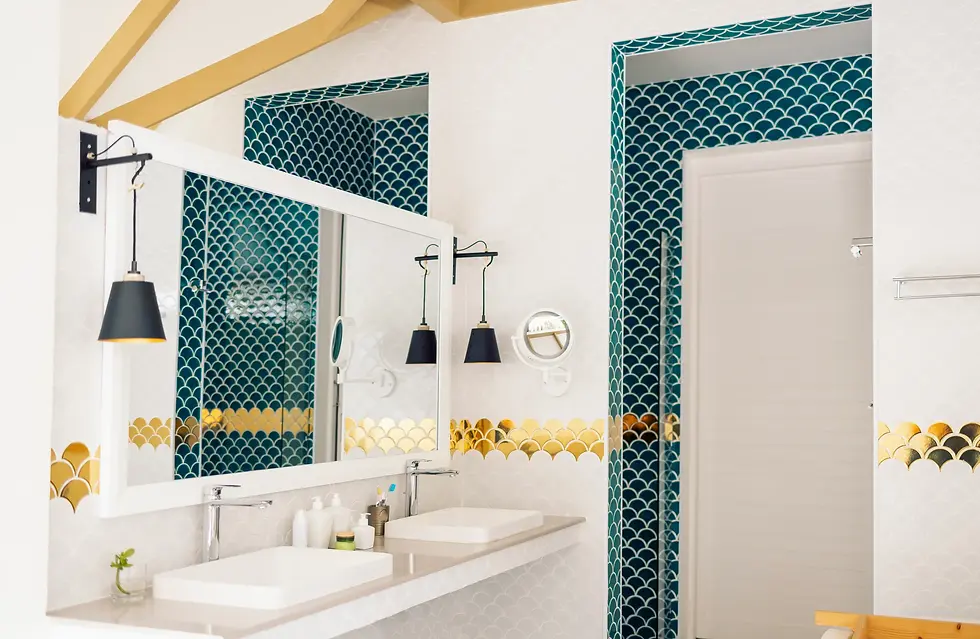 Bathroom with mosaic fish scale tile — bathroom design mistake due to excessive grout lines and high maintenance