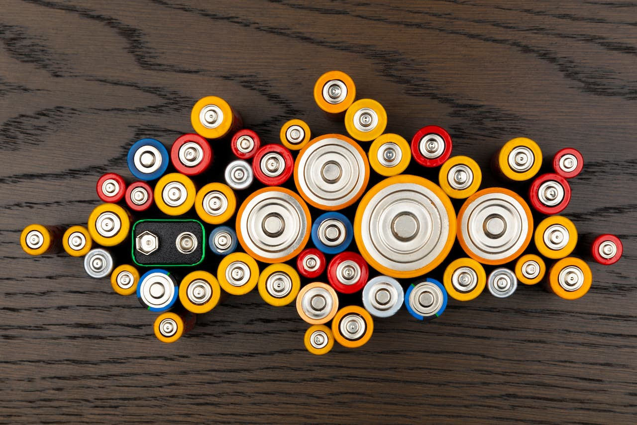 mixed used batteries collected for proper household hazardous waste disposal