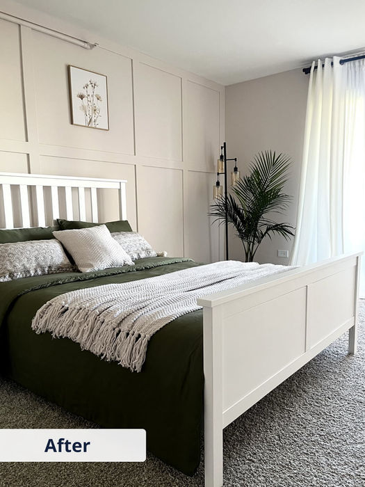 After photo of a stylish bedroom featuring custom painted panel accent wall in warm beige tones