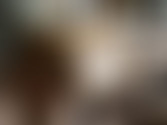 Person holding a self-packed box with a Fragile sticker, illustrating the risks of Released Value Protection (RVP)