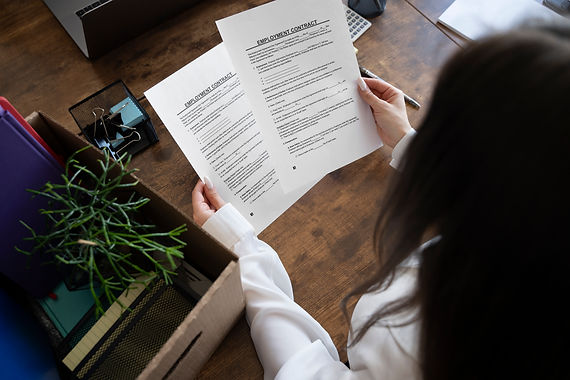 woman-holding-documents-high-angle.jpg
