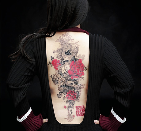 best singapore female feminine full back tattoo