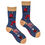 Thumbnail: Close up of women's blue novelty socks with dogs in pyjamas design