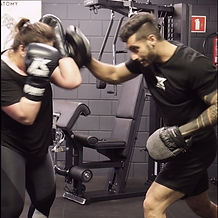 Kebko Kabakibi demonstrating boxing training in Amsterdam noord