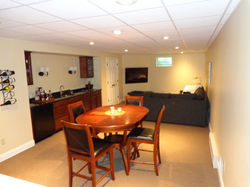 Family Room added with an in-law suite on the other side of the wall.