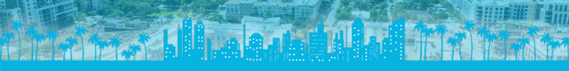 Panoramic view of Fort Lauderdale’s cityscape, highlighting modern buildings, lush greenery, and the new river.
