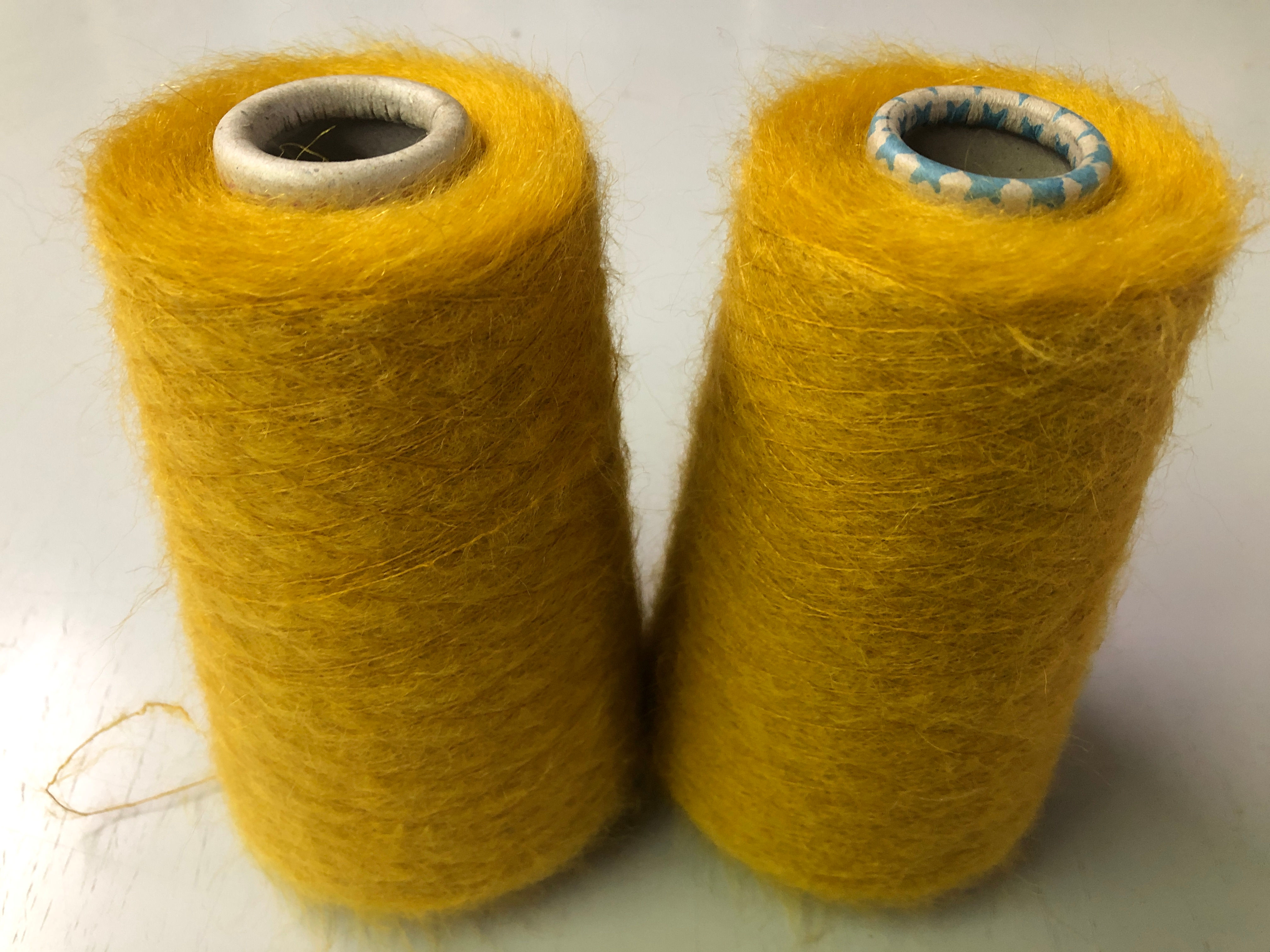 67% Mohair 3% Merino 30% Polyamid Nm10 " Aurora "